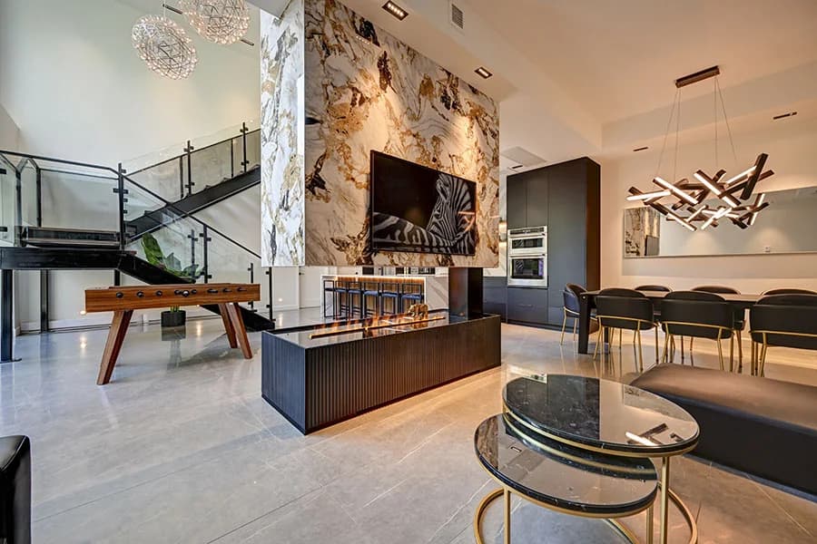 Clubhaus VIP Suite — main lounge and fireplace